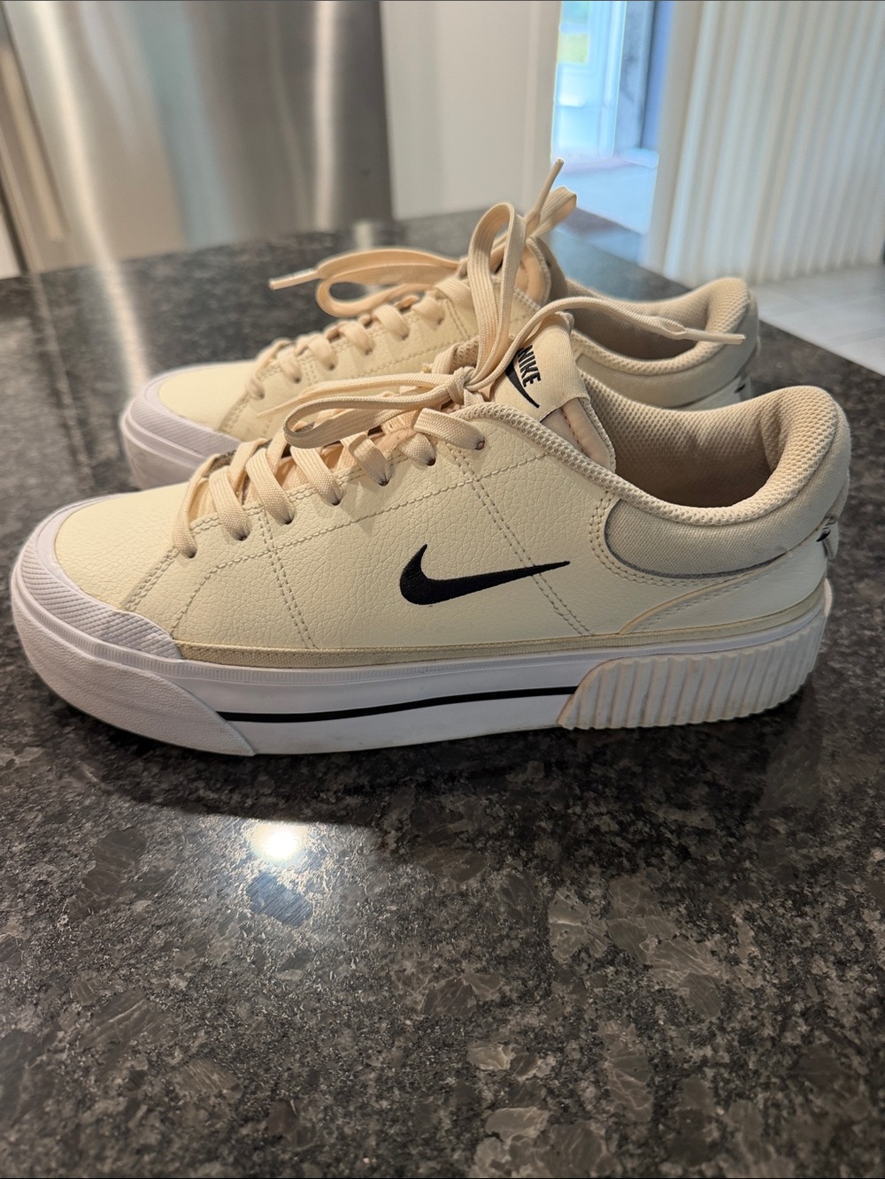 Nike Cream Low-Top Sneakers with Black Swoosh